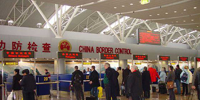 China restricts all travel of foreigners into the country