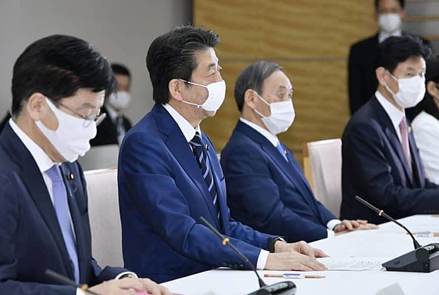 Japan to give two masks each to 50 million households to fight virus