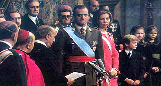 título de rey a Juan Carlos de Borbón
