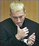 Eminem faced new gun charges. He recorded an album called Devil's Night