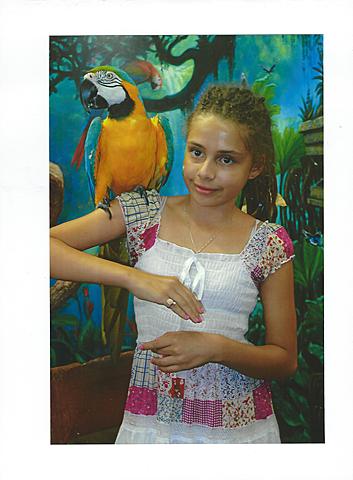 With Luci the macaw