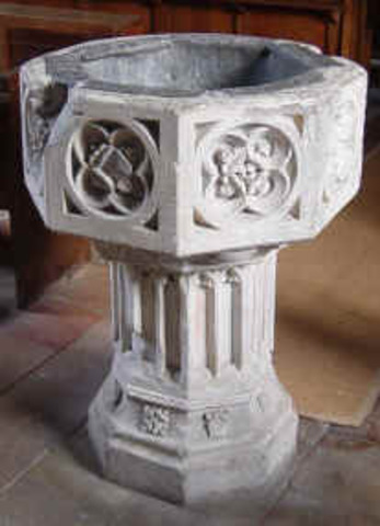 The Baptismal font is late 14th C