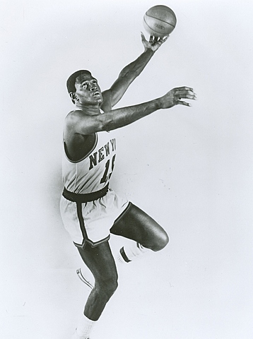 Willis Reed Hobbles off court