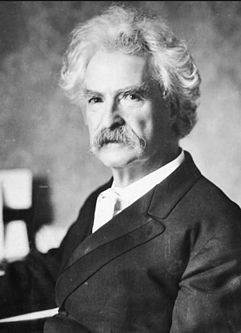 Mark Twain writes Huckleberry Finn