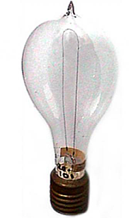 Edison invents electric light bulb