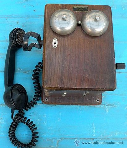 Telefono Español de pared de madera