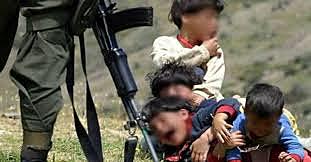 ACTUALMENTE NIÑOS Y NIÑAS EN EL CONFLICTO ARMADO.