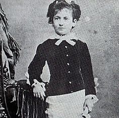 Begins schooling, age 6, in Rome