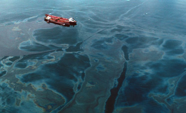 Exxon Valdez spills tons of oil
