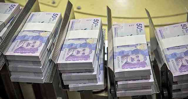 LA FABRICACIÓN DE BILLETES Y MONEDAS.