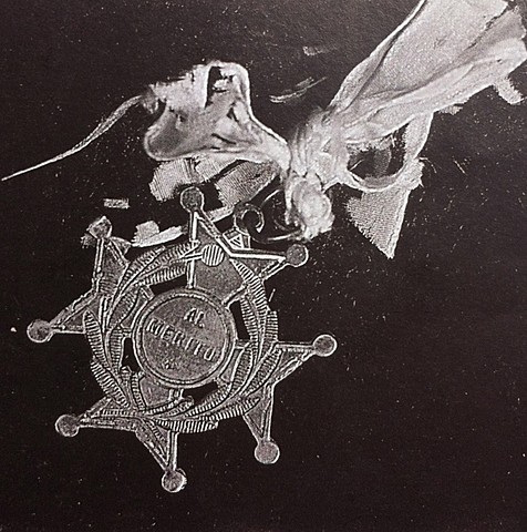 "José presunción" medalla en plata al mérito.