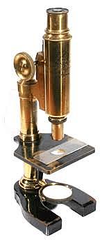 Microscopio monocular de 28 cm y sistema revolver