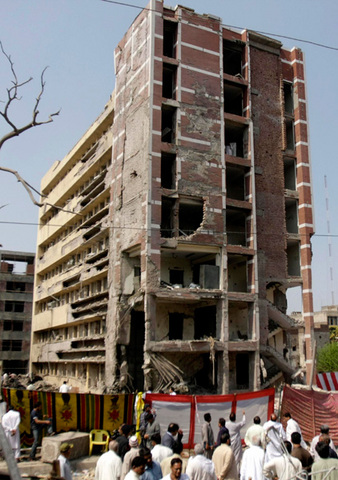 An <a href="http://www.nytimes.com/2008/03/12/world/asia/12pstan.html" rel="ugc nofollow">attack on the regional office of the Federal Investigation Agency</a> in Lahore kills 12 agency officials and nine others.
