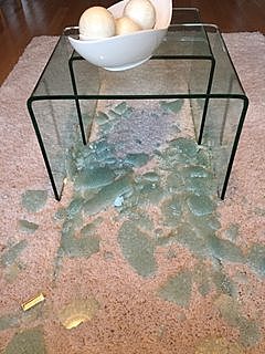 I broke the glass on the dining room table.