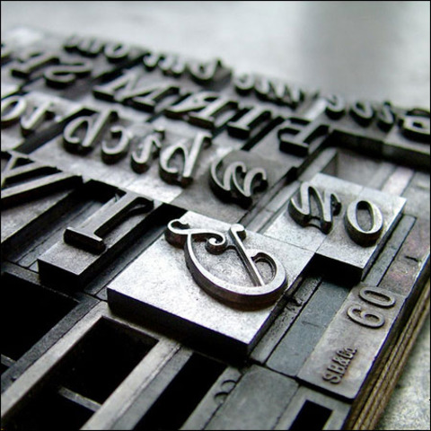 Johann Gutenberg invents a printing prss using movable metal type.