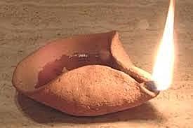 Invención de las lámparas de aceite.