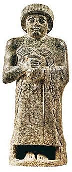 Statuetta di gudea/ statua del vaso traboccante