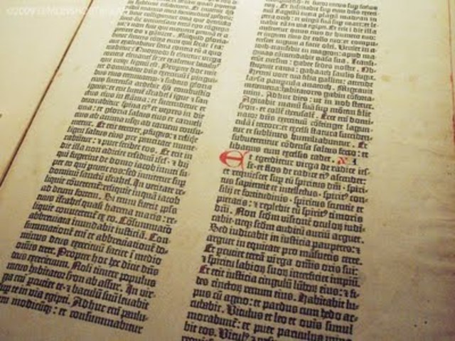 Johann Gutenberg invents a printing press using movable metal type.