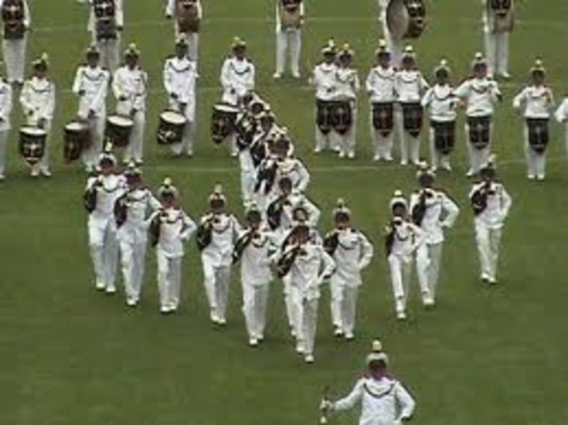 Integrante de la banda escolar.