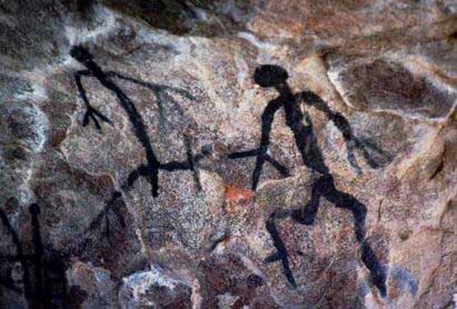 Neanderthal man carves a picture on a woolly mammoth tooth 45,000 BC