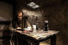 Polo is imprisoned and writes his own book