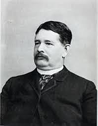 Samuel Dodd desarrolla la idea de monopolios.