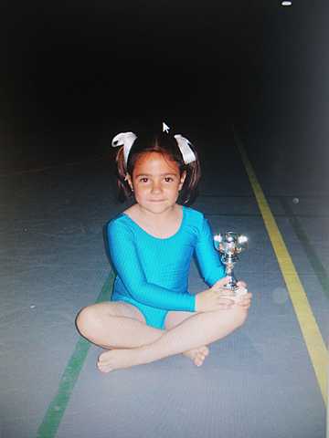 I win a gymnastics trophy