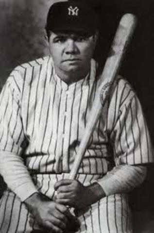 Babe Ruth sets single season home run mark at 60.