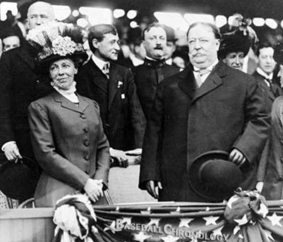 William H. Taft throws the first pitch of a baseball game