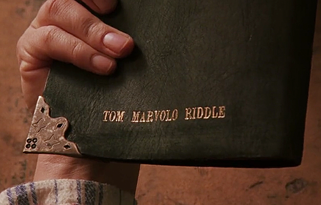 Malfoy sneaks Voldemort's diary into Harry's books