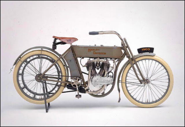 Alcamini learns to ride a Harley Davidson