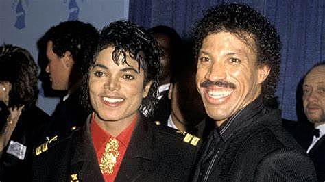 Michael Jackson works with Lionel Richie to co-release' 'WE ARE THE WORLD''