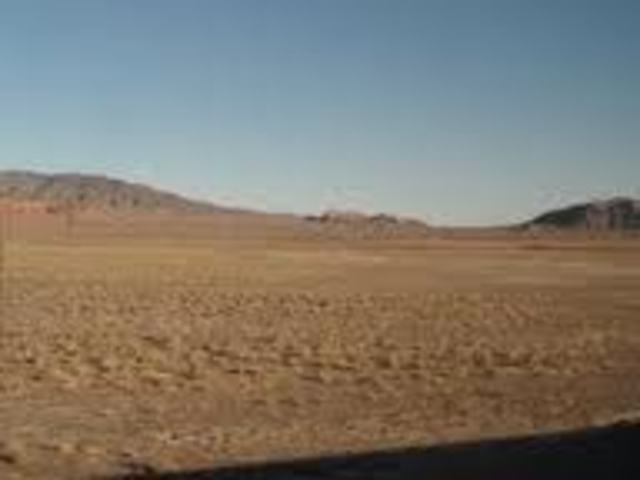 Since the Indians have killed almost all his cattle, a German emigrant named Wolfinger stops at the Humboldt Sink to cache his wagon.