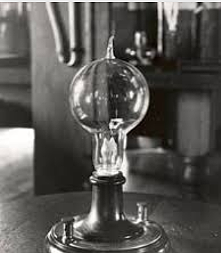 Thomas Edison brings light to the world with the light bulb