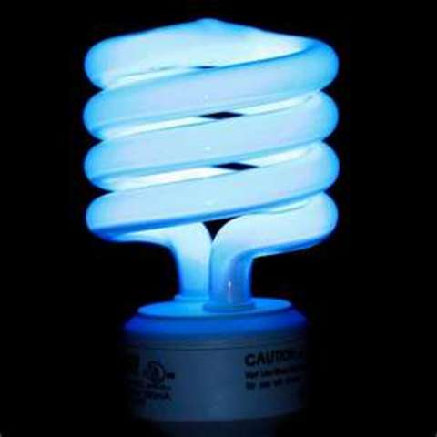 First practical screw in CFL bulb invented
