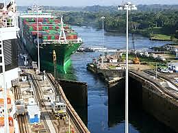 The Panama Canal is completed and opened for traffic