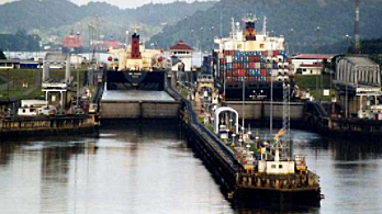 The Panama Canal is completed and opened for traffic