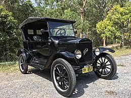 Henry Ford produced his first Model T(car)