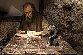 Polo imprisoned and writes his book