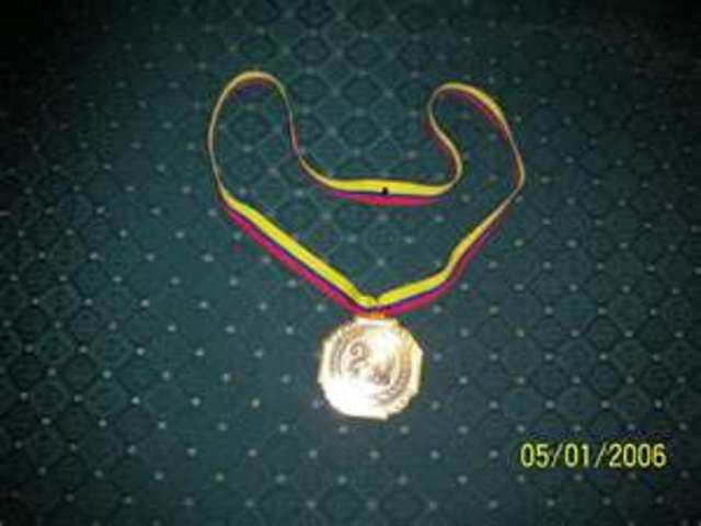 recibi mi medalla por mejor estudiante