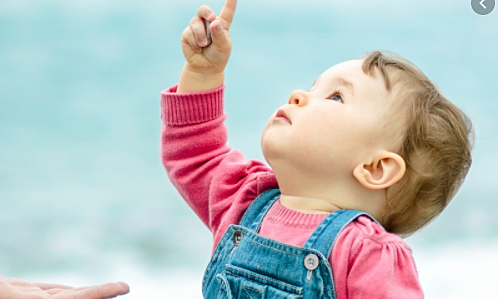 Uses fingers to point at things