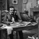 Poe at desk
