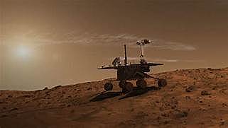 Dos vehicles es passegen per la superfície de Mart per estudiar-ne les roques