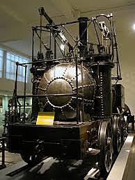 Primera locomotora de vapor sobre rieles metálicos, sin uso  comercial, construida por Hedley.