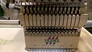 Primera máquina de bordar industrial electromecánica