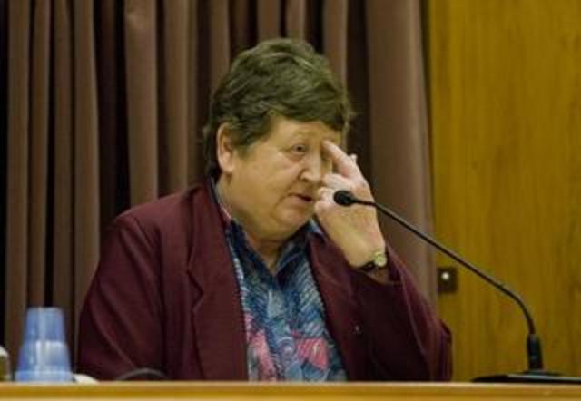 Bain's fingerprints in blood on the murder weapon