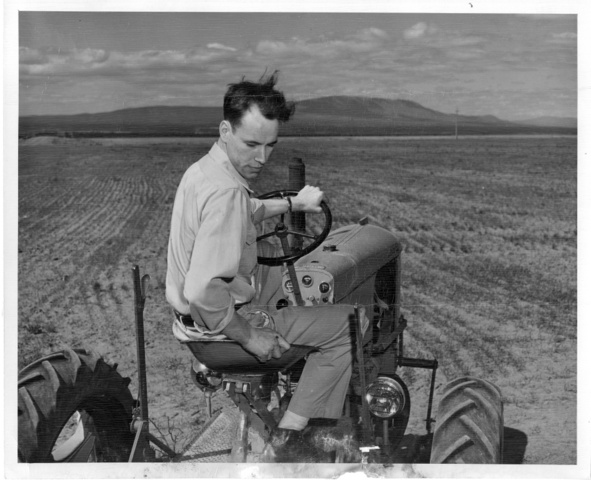 Warren Clifford prepares the land on his 150 acre plot on the Pasco Unit of the Columbia Basin Project