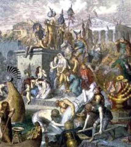 vandals enter rome and burn and loot city.