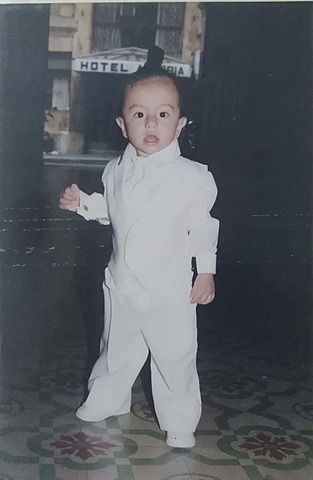 A little big baby, with a happy face.