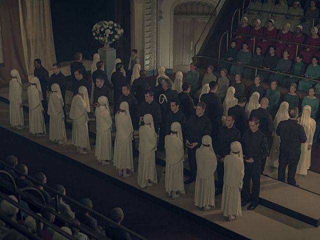 Offred attends a Prayvaganza